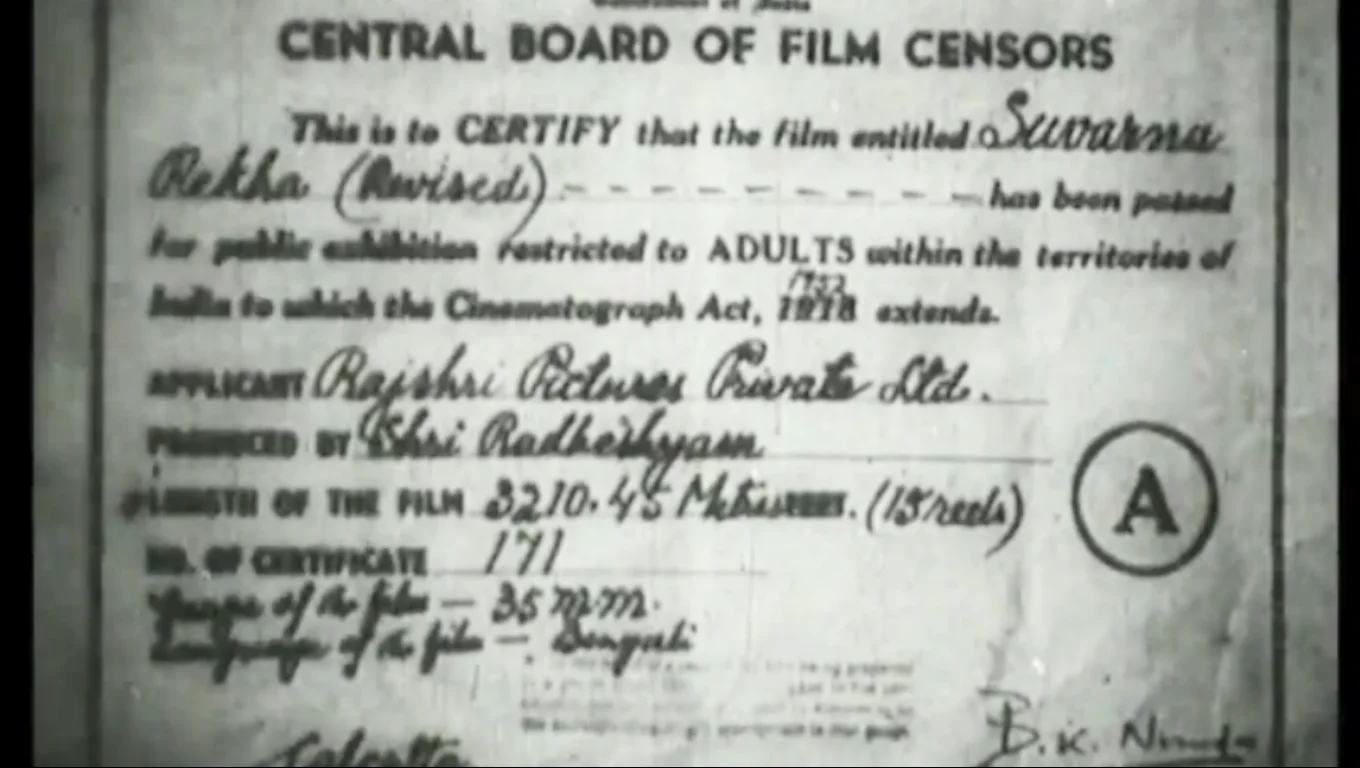 A black and white censor certificate headed Central Board of Film Censors, certifying that the film Suvarna Rekha (Revised) has been passed for public exhibition restricted to adults, with the length 3210.45 metres in 13 reels, the language Bengali and a large circled letter A