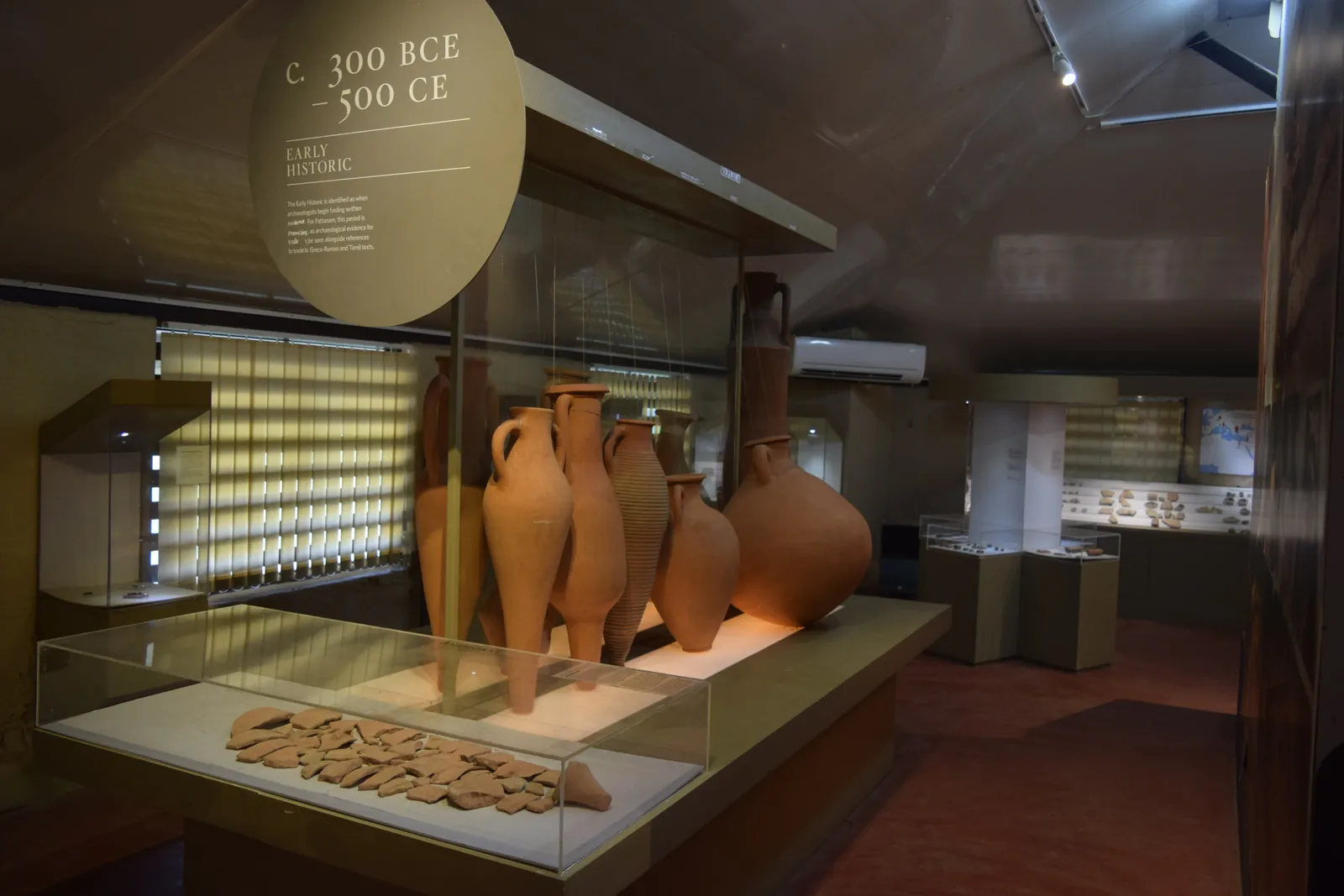 Roman-era amphorae and pottery sherds on display at the Pattanam excavation museum in Kerala